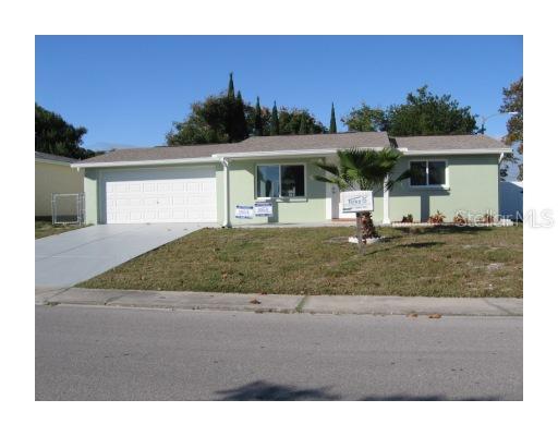 9321 Rainbow Lane Port Richey, FL 34668 - Photo 1 of 1 a house view with a outdoor space