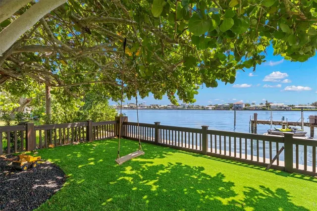 a view of swimming pool from a window