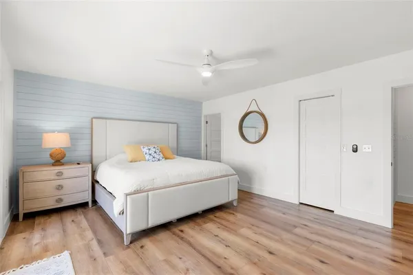 a bed room with a bed and a couch