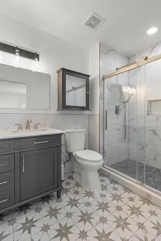 a view of a chair and tables on the terrace