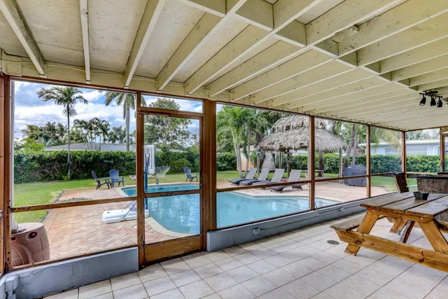 a view of swimming pool with a patio