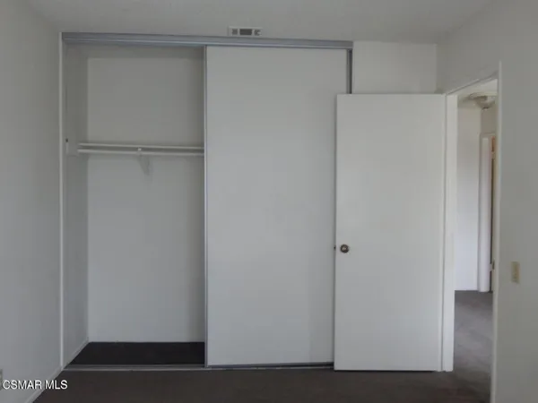 a view of a house with a street