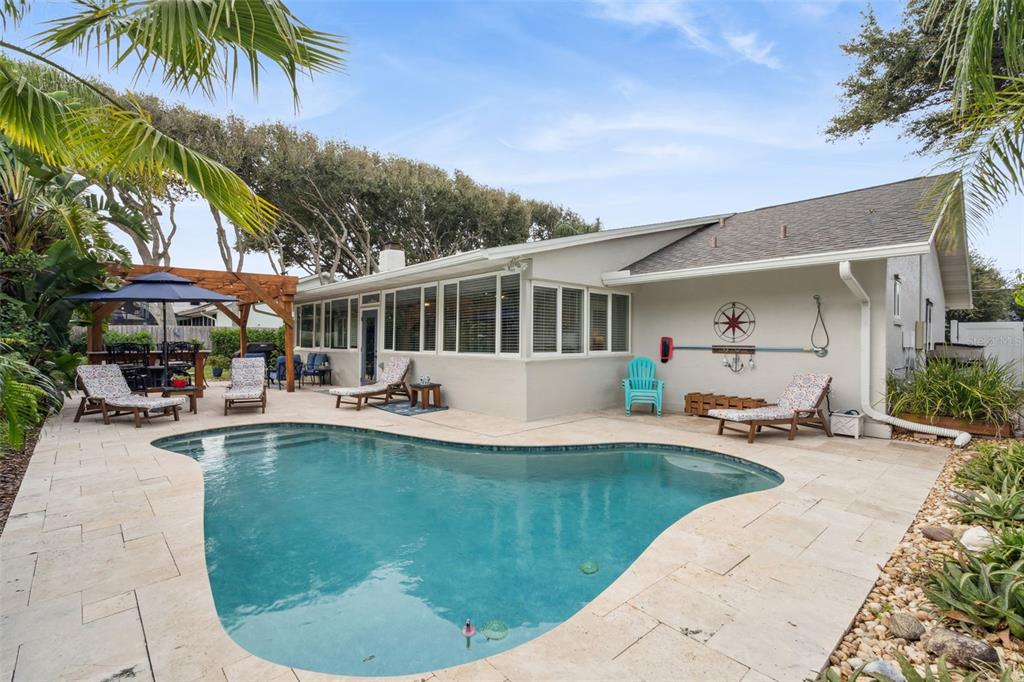 75 Calumet Avenue Ponce Inlet, FL 32127 - Photo 19 of 35 a view of a house with swimming pool and sitting area