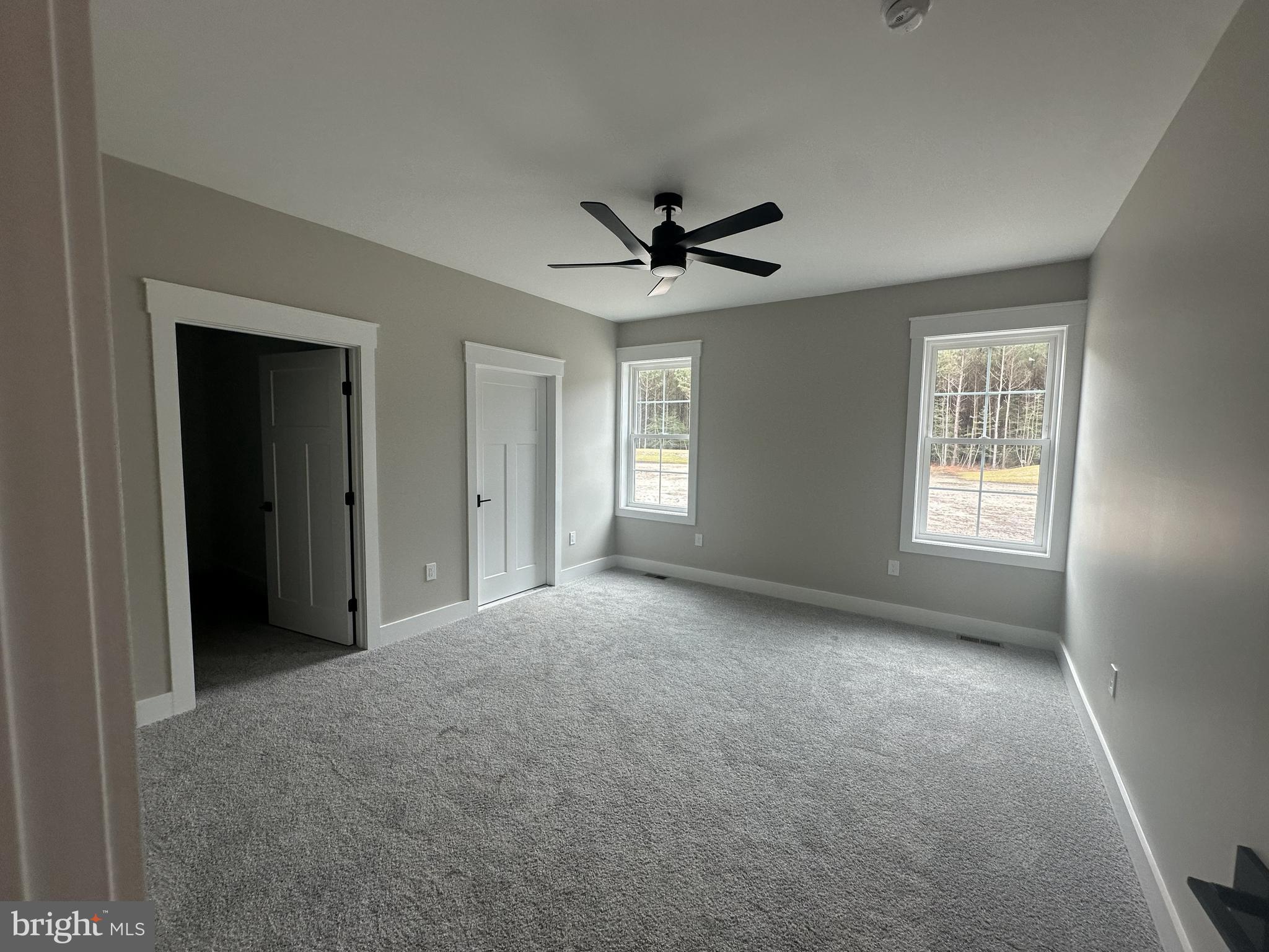 19426 Parsons Road Georgetown, DE 19947 - Photo 15 of 18 a view of a livingroom with a ceiling fan and window