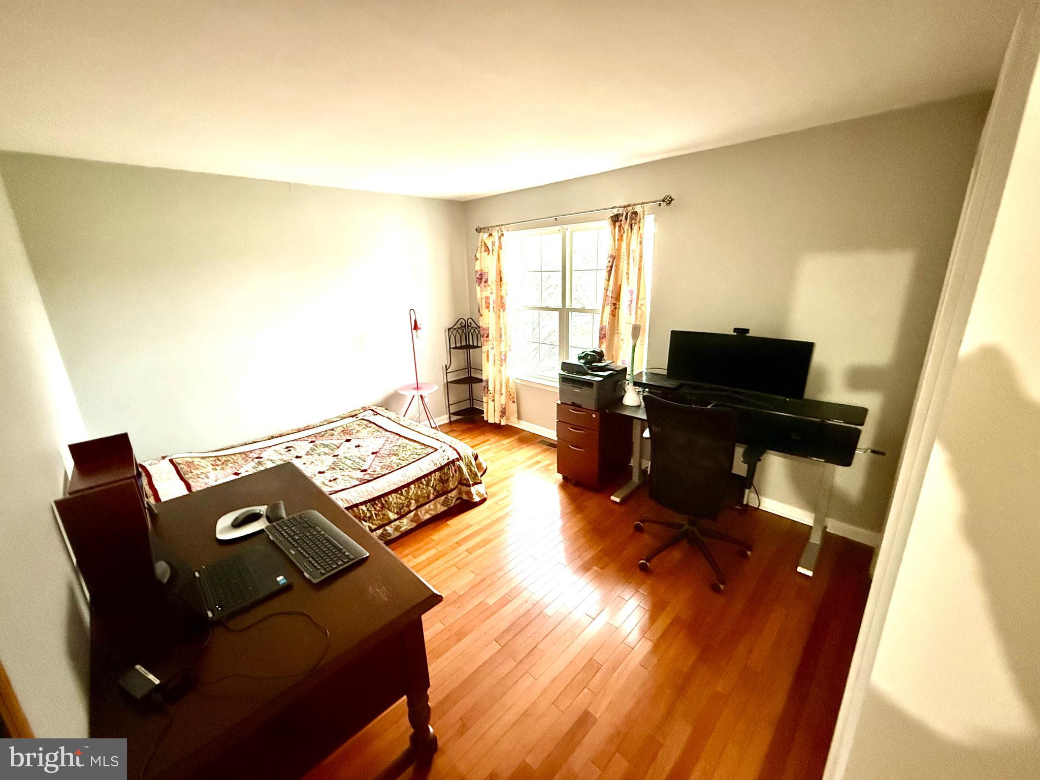 15 Coburn Road Pennington, NJ 08534 - Photo 14 of 30 a living room with furniture and wooden floor
