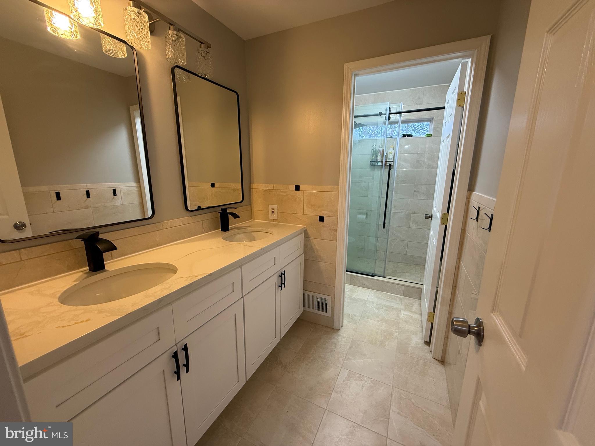 15 Coburn Road Pennington, NJ 08534 - Photo 17 of 30 a bathroom with a double vanity sink mirror and double