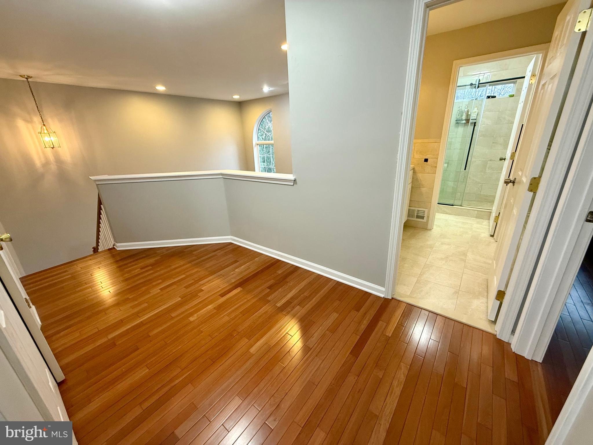 15 Coburn Road Pennington, NJ 08534 - Photo 19 of 30 a view of empty room with wooden floor