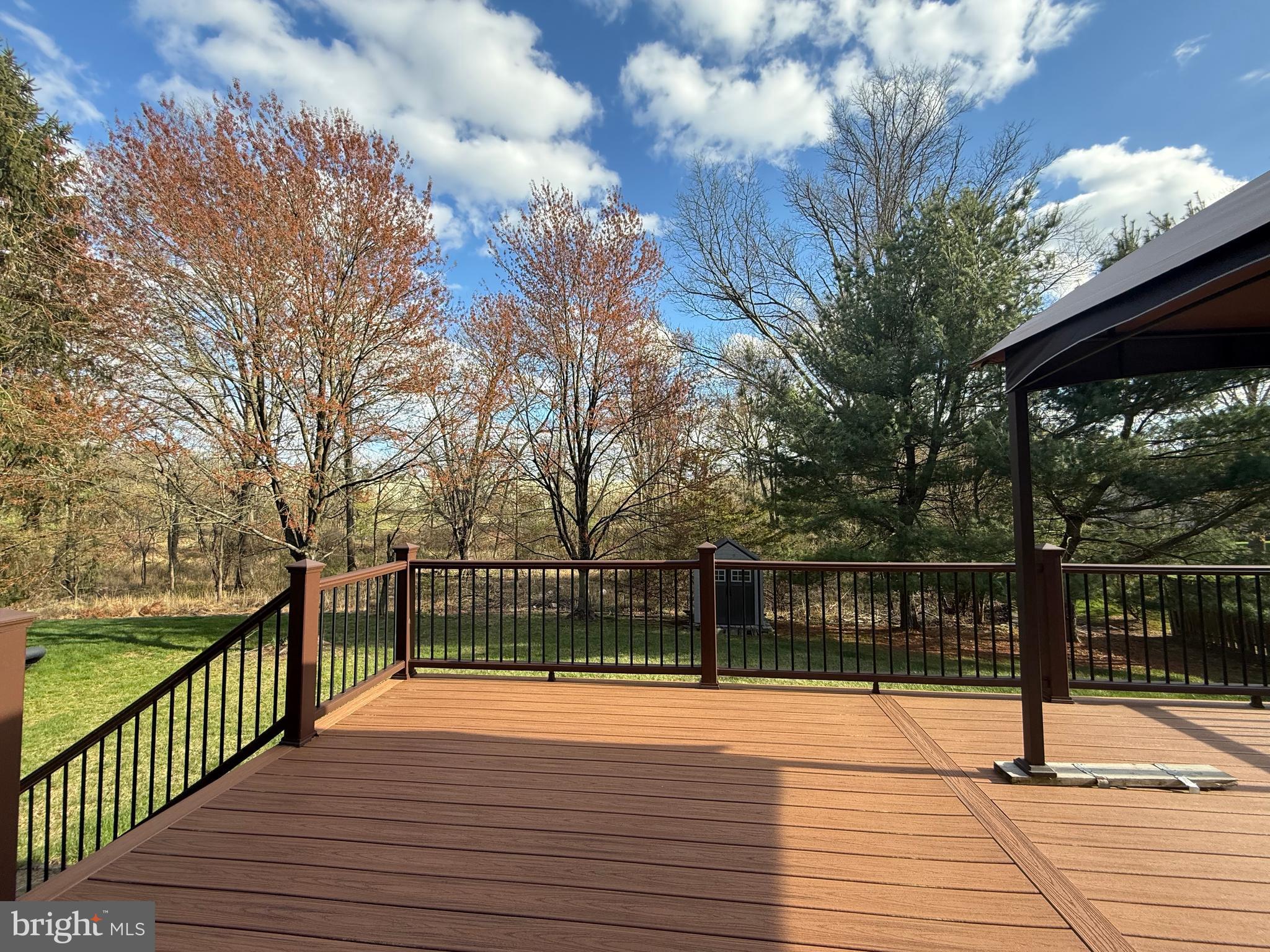 15 Coburn Road Pennington, NJ 08534 - Photo 27 of 30 a view of a terrace with wooden floor and fence