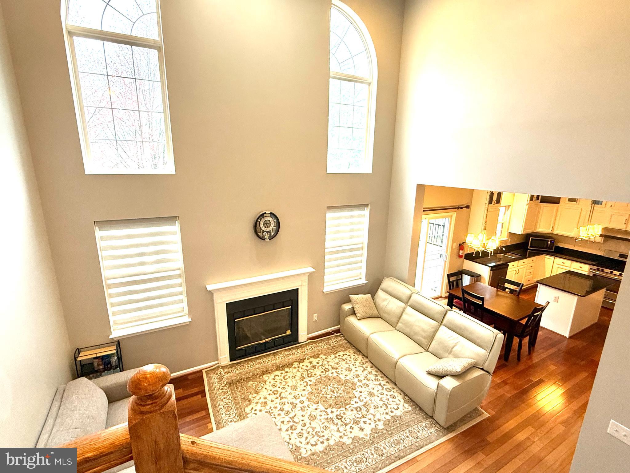 15 Coburn Road Pennington, NJ 08534 - Photo 5 of 30 a living room with furniture and a fireplace
