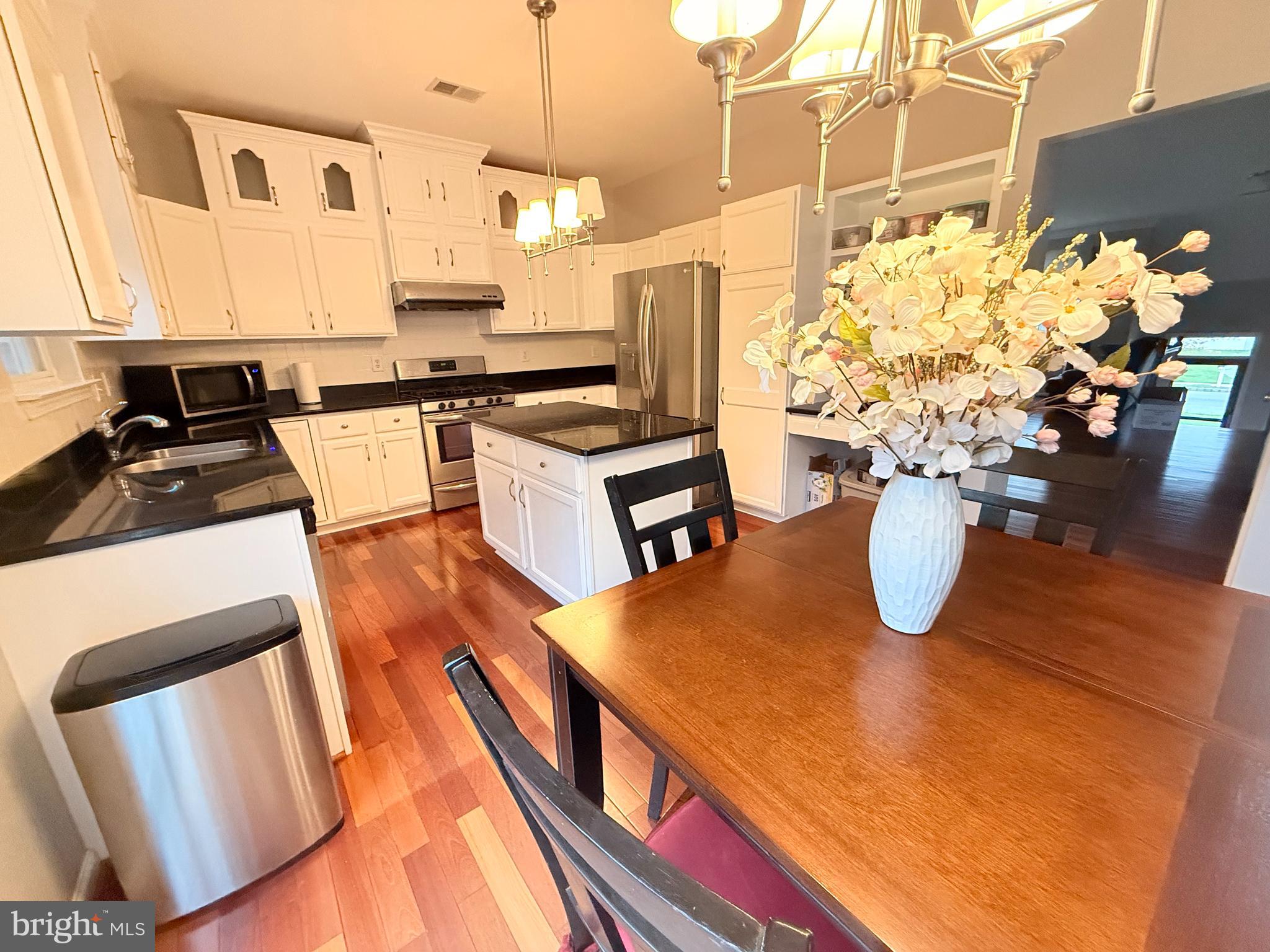 15 Coburn Road Pennington, NJ 08534 - Photo 8 of 30 a kitchen with sink and refrigerator