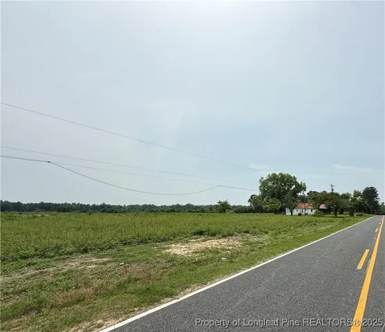 a view of a lake with a big yard