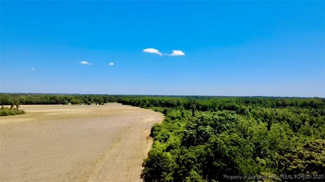 a view of an ocean and yard