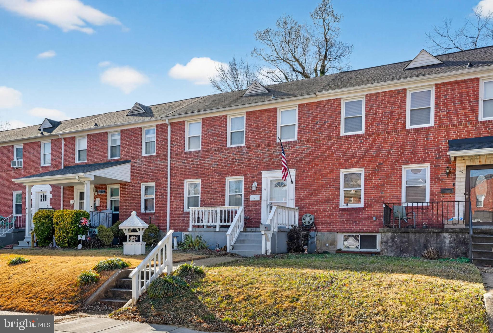 Charming brick row homes with inviting porches.
