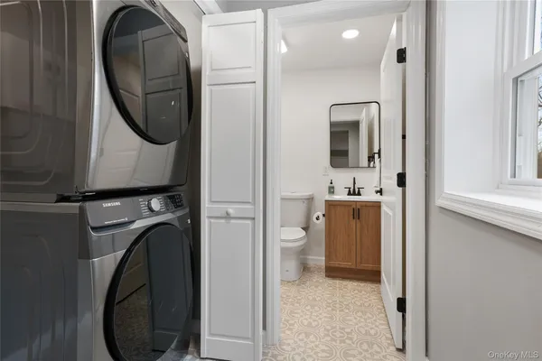 a view of a bathroom with a toilet and a sink