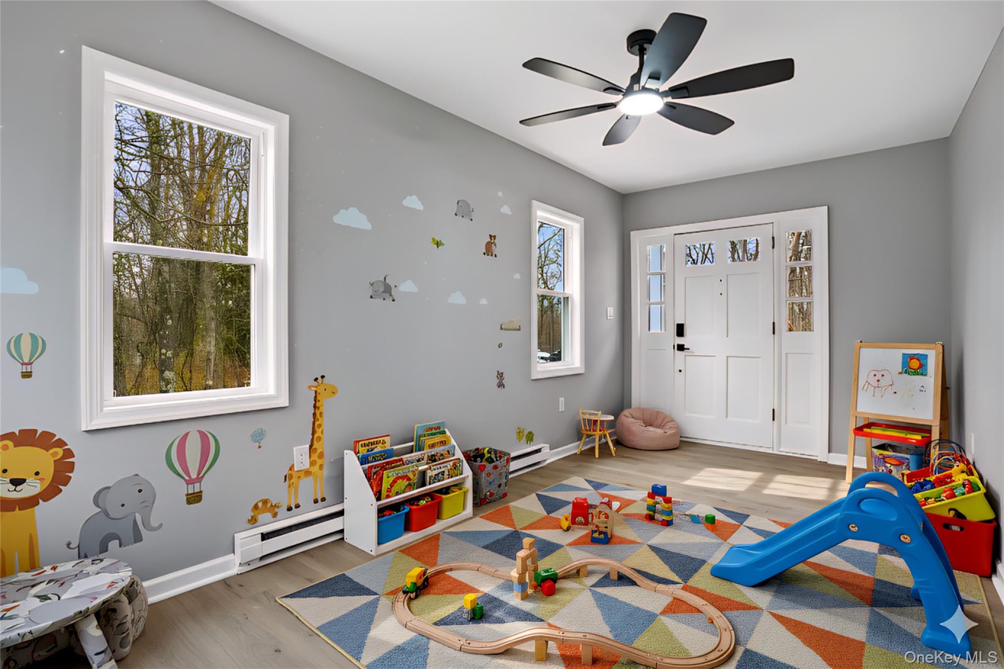 517 East Mountain Road North, Unit 515517 Cold Spring, NY 10516 - Photo 12 of 30 a bed room with furniture and paintings on the wall