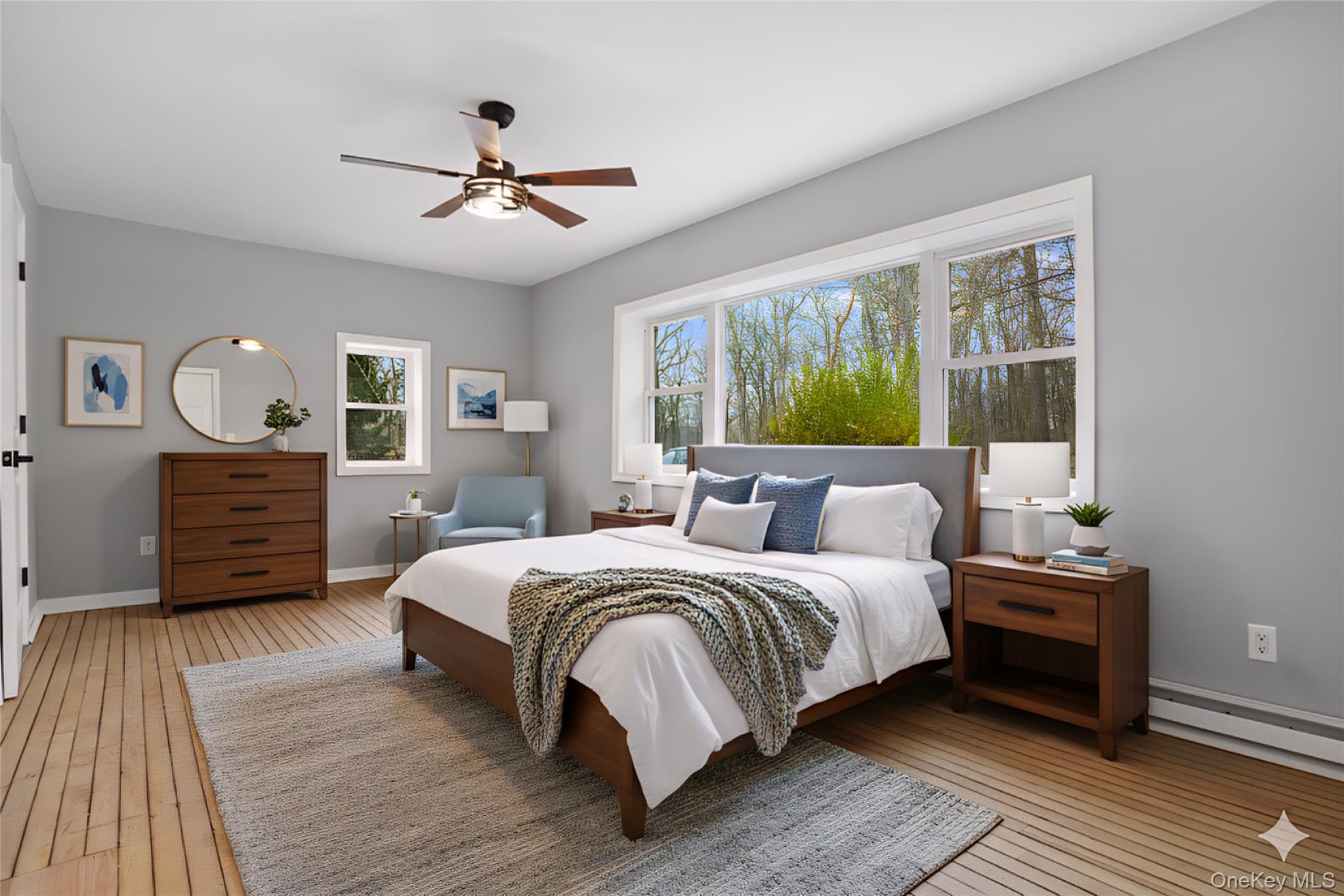 517 East Mountain Road North, Unit 515517 Cold Spring, NY 10516 - Photo 14 of 30 a bedroom with a large bed and a chandelier