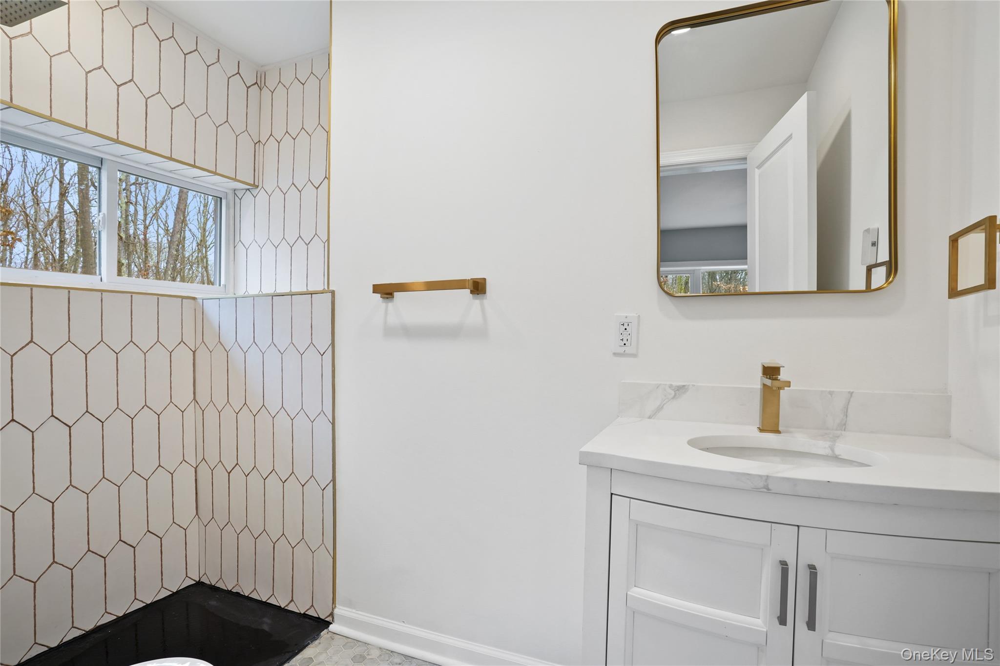 517 East Mountain Road North, Unit 515517 Cold Spring, NY 10516 - Photo 17 of 30 a bathroom with a sink and a mirror