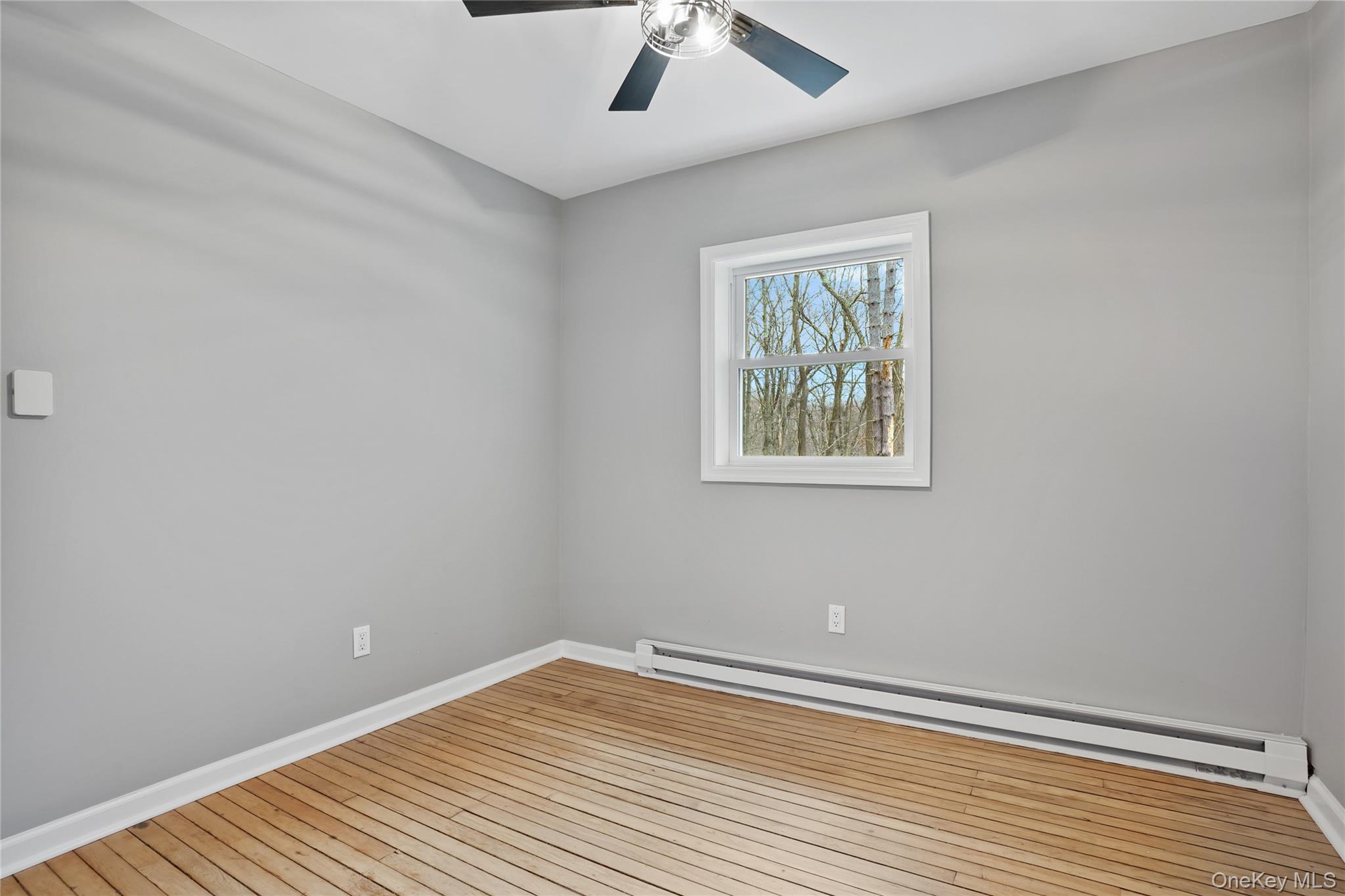 517 East Mountain Road North, Unit 515517 Cold Spring, NY 10516 - Photo 20 of 30 a view of room with window and wooden floor