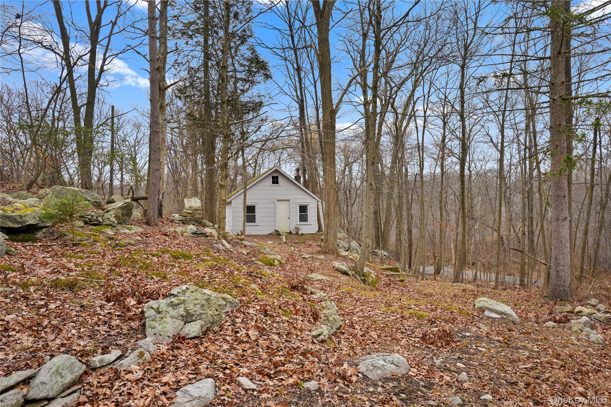 517 East Mountain Road North, Unit 515517 Cold Spring, NY 10516 - Photo 27 of 30 a view of a house with a yard covered in snow