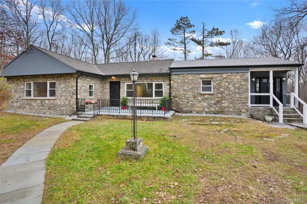 front view of a house with yard