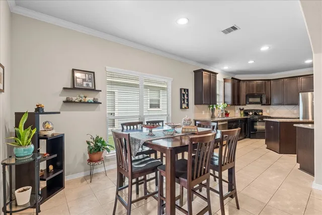 a view of a dining room with furniture