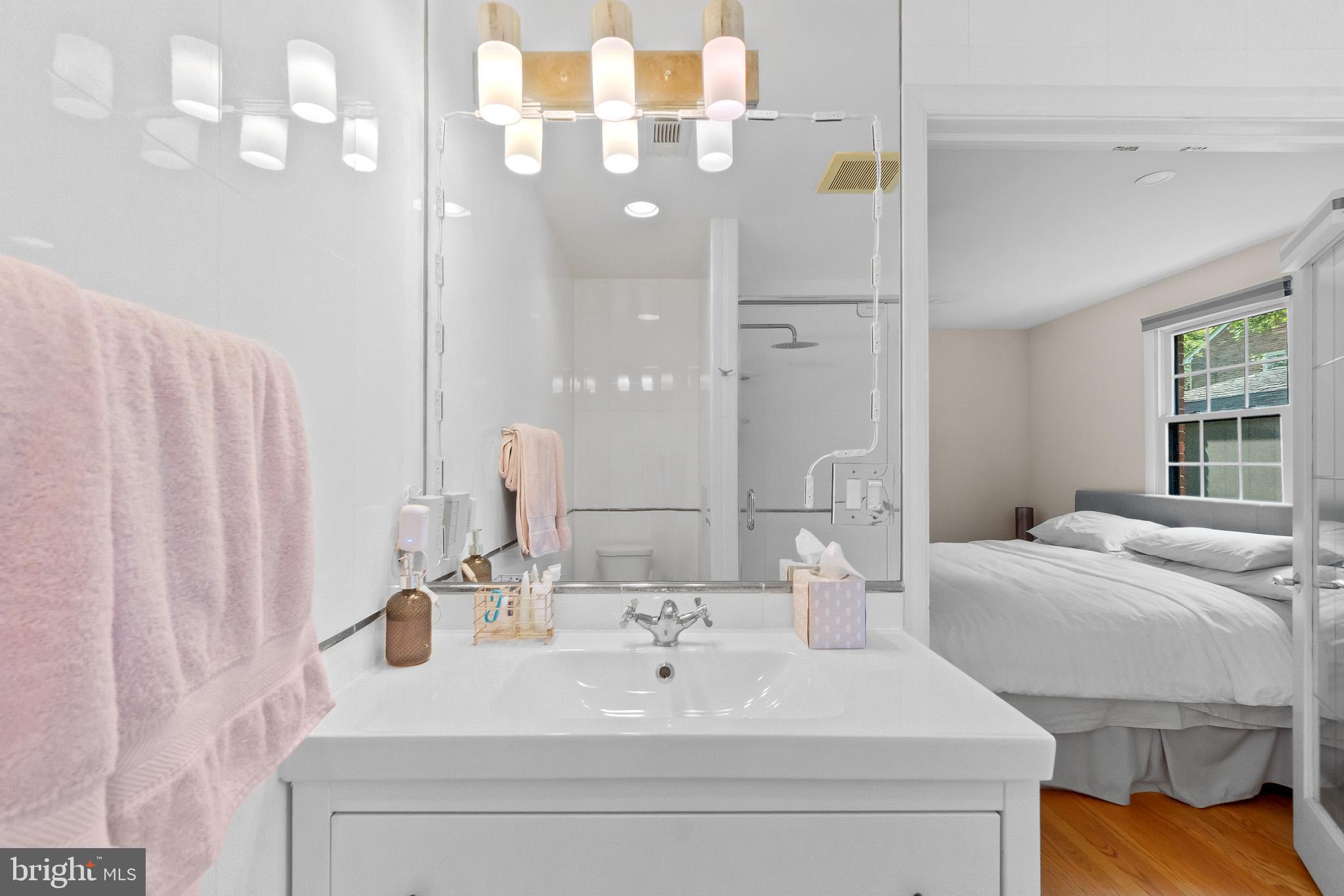 2003 Forest Dale Drive Silver Spring, MD 20903 - Photo 17 of 44 a bathroom with a sink and a mirror