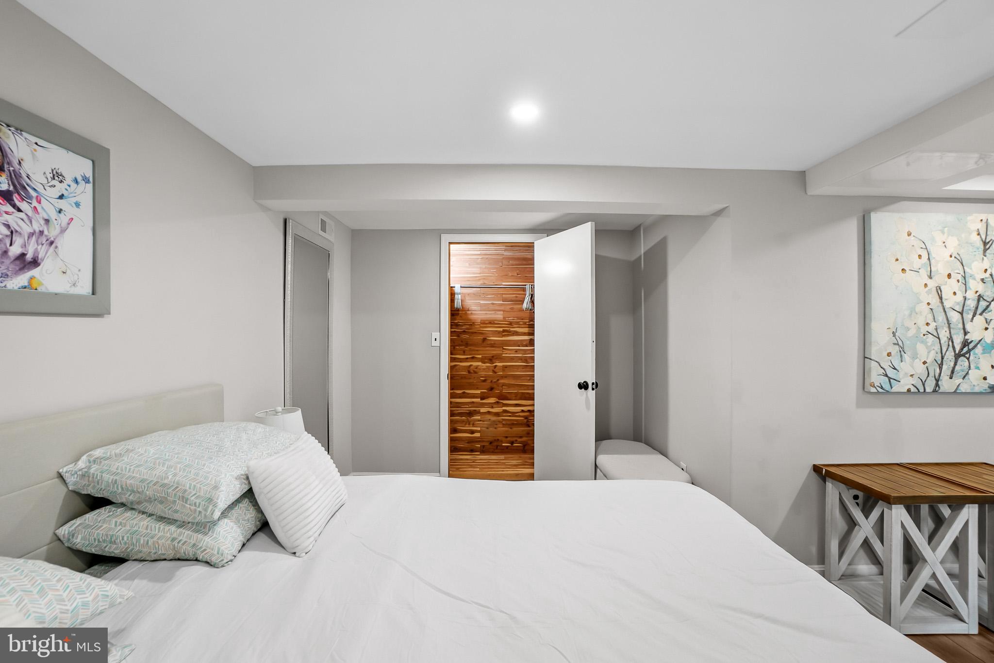 2003 Forest Dale Drive Silver Spring, MD 20903 - Photo 26 of 44 a bedroom with a bed and a window
