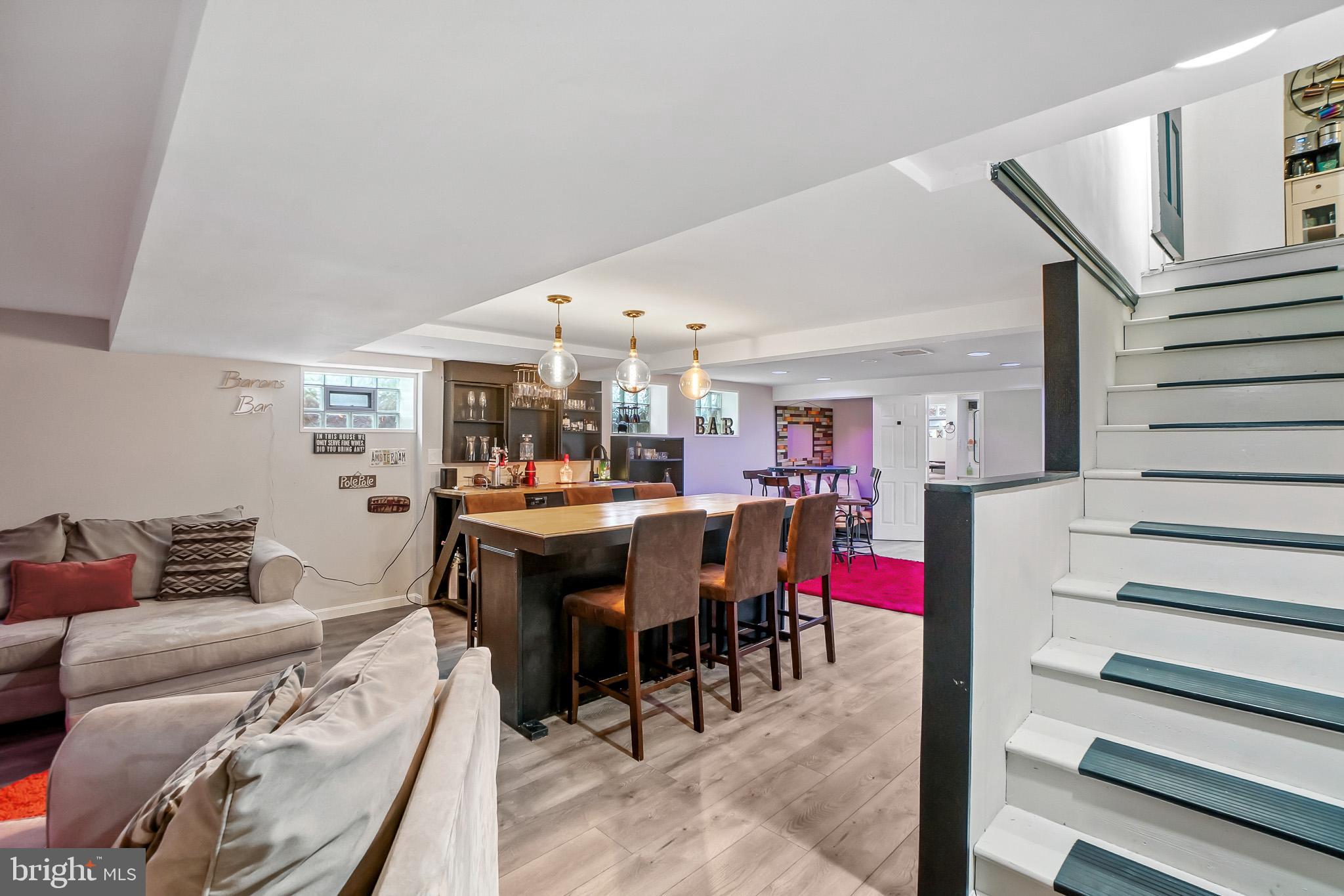 2003 Forest Dale Drive Silver Spring, MD 20903 - Photo 29 of 44 a view of a dining room with furniture and a kitchen
