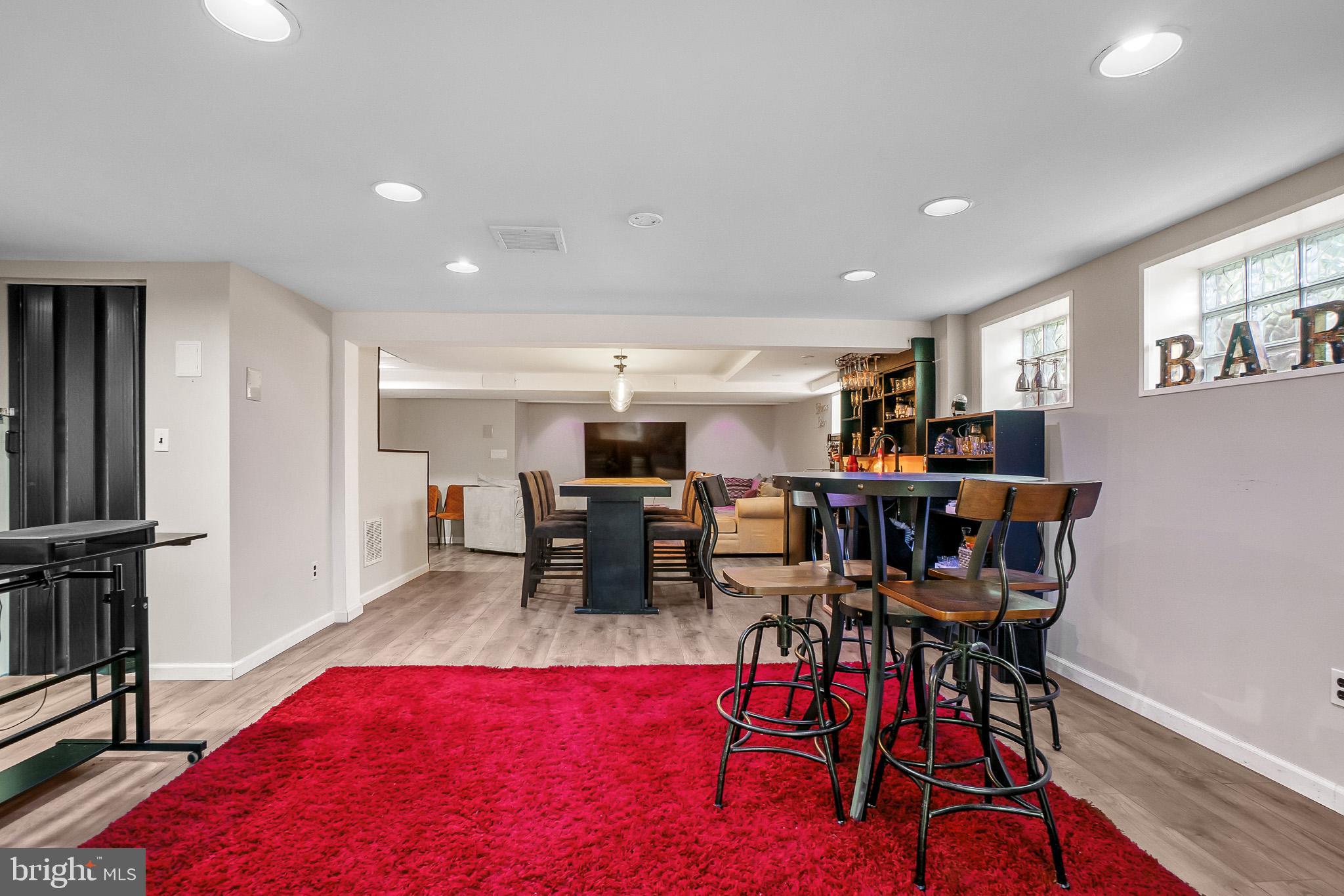 2003 Forest Dale Drive Silver Spring, MD 20903 - Photo 32 of 44 a view of a dining room with furniture window and wooden floor