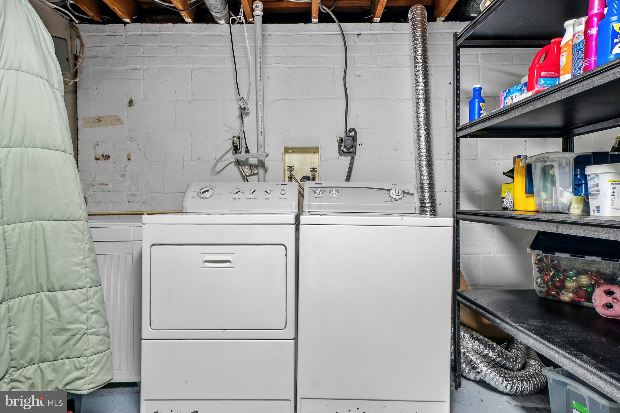 2003 Forest Dale Drive Silver Spring, MD 20903 - Photo 34 of 44 a utility room with dryer and washer