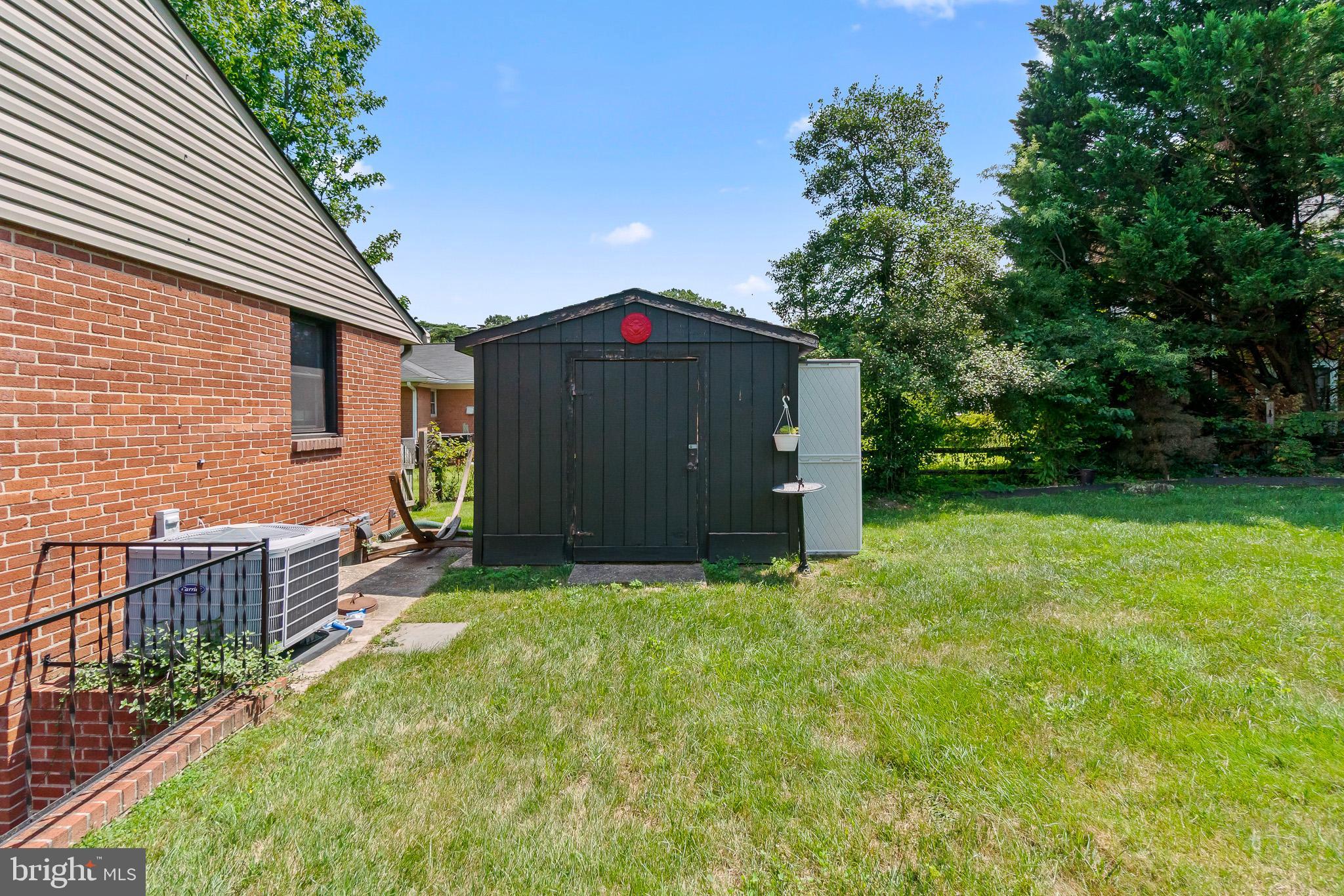 2003 Forest Dale Drive Silver Spring, MD 20903 - Photo 42 of 44 a view of backyard with barbeque grill and a tub