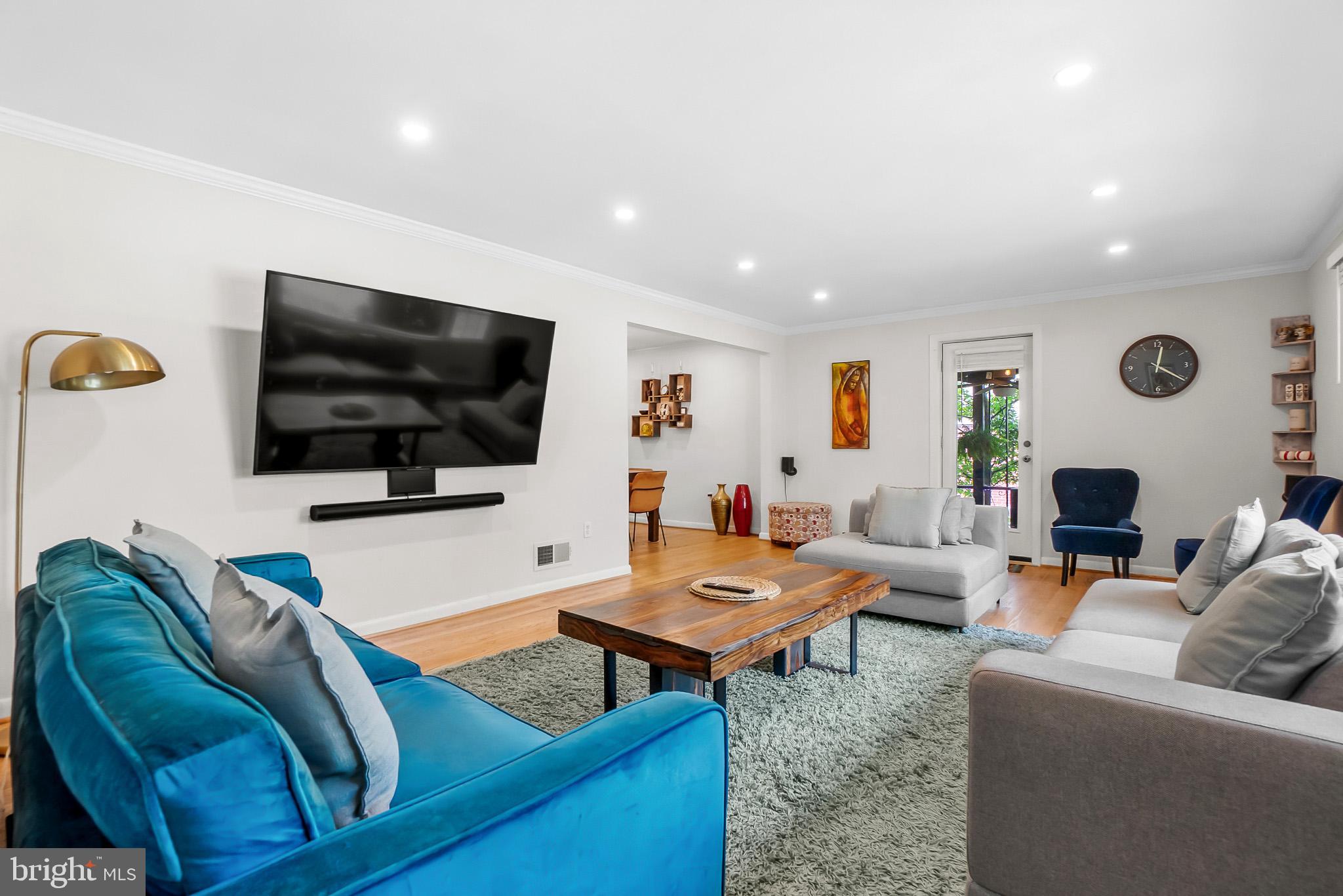 2003 Forest Dale Drive Silver Spring, MD 20903 - Photo 5 of 44 a living room with furniture and a flat screen tv