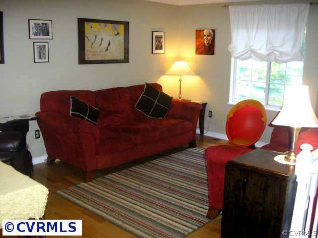 10512 White Rabbit Road Richmond, VA 23235 - Photo 4 of 10 a living room with furniture and a window