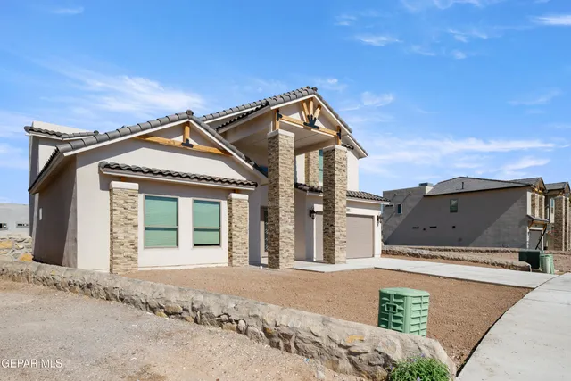 a front view of a house with a pathway