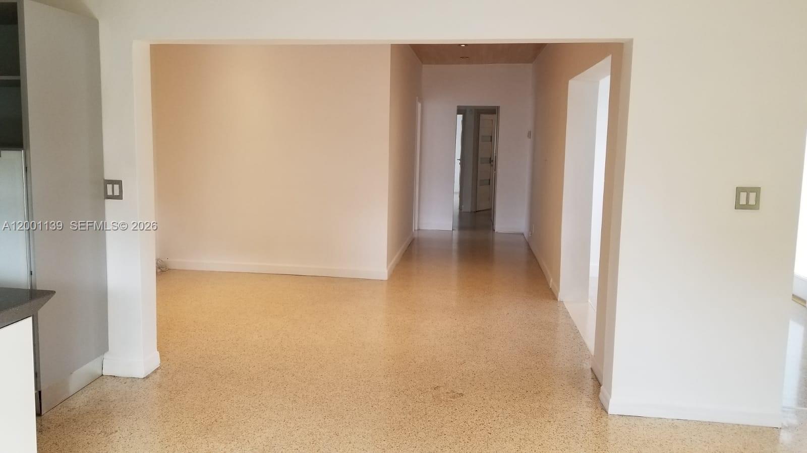 625 93rd Street Surfside, FL 33154 - Photo 23 of 50 a view of a hallway with wooden floor