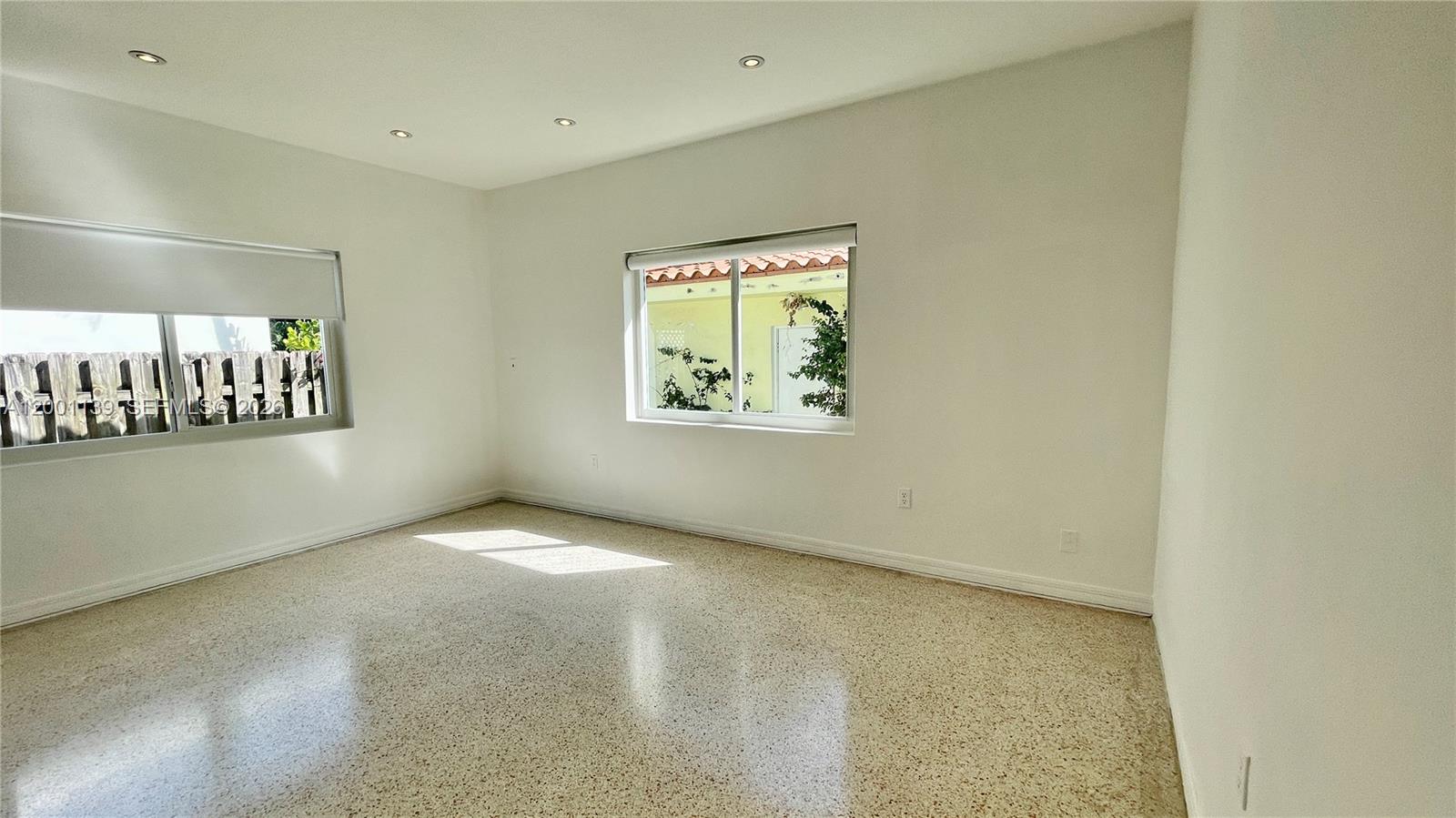 625 93rd Street Surfside, FL 33154 - Photo 34 of 50 a view of an empty room with a window
