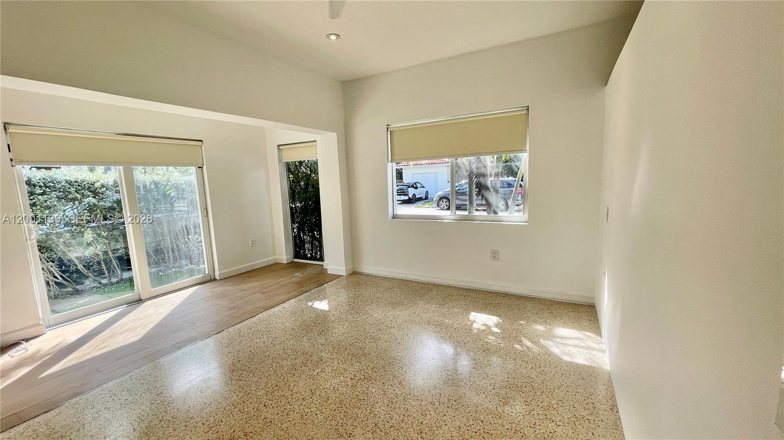 625 93rd Street Surfside, FL 33154 - Photo 37 of 50 an empty room with windows