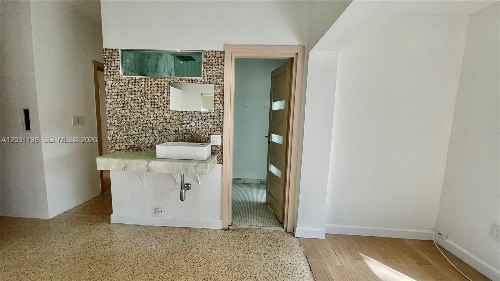 625 93rd Street Surfside, FL 33154 - Photo 39 of 50 wooden floor view of a bathroom