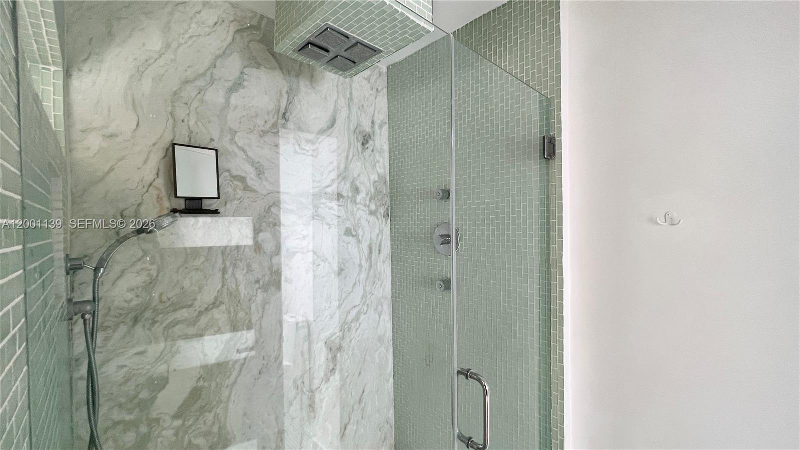 625 93rd Street Surfside, FL 33154 - Photo 40 of 50 a bathroom with a shower