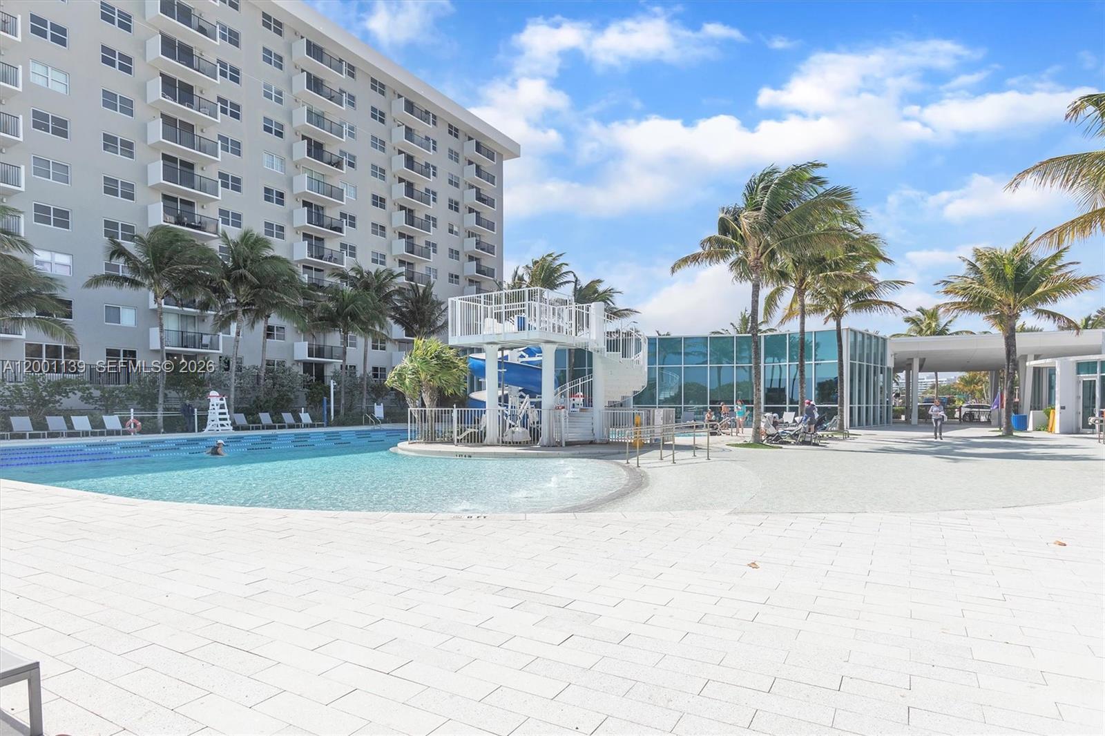 625 93rd Street Surfside, FL 33154 - Photo 49 of 50 a view of a building with a yard