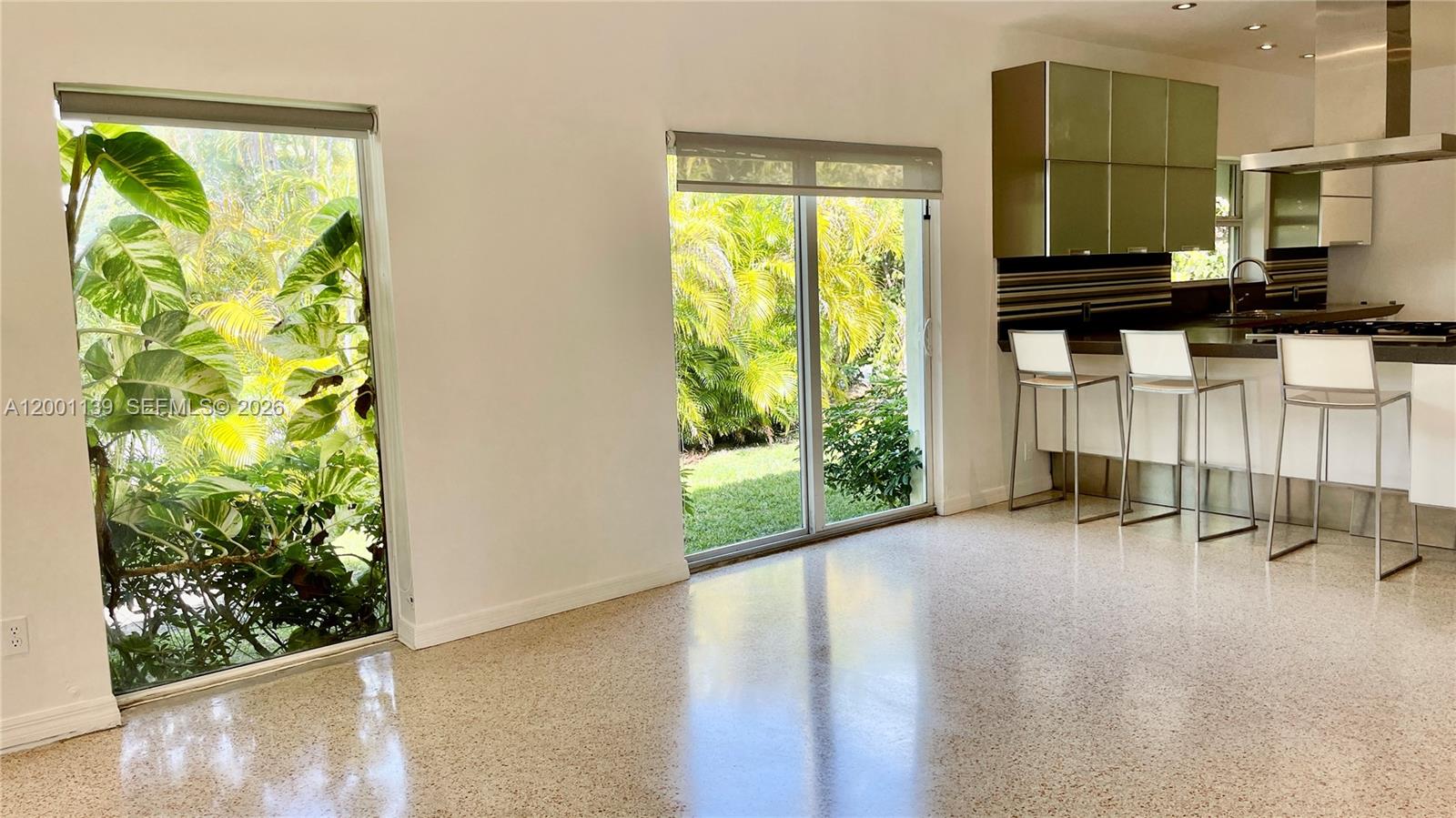 625 93rd Street Surfside, FL 33154 - Photo 9 of 50 a view of a room with a large window