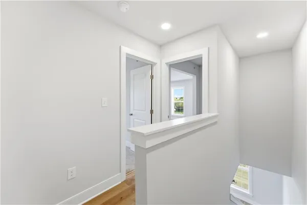 a view of a hallway with front door