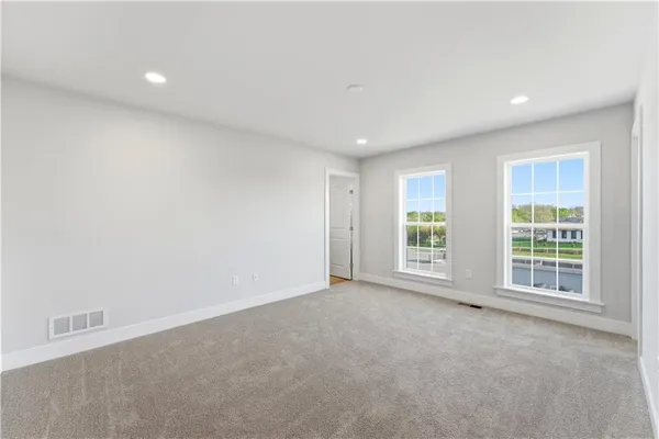 an empty room with windows