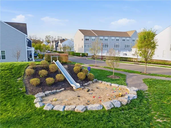 a view of a swimming pool with a yard