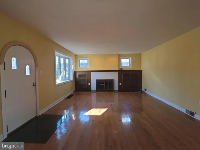 a kitchen with a stove and cabinets
