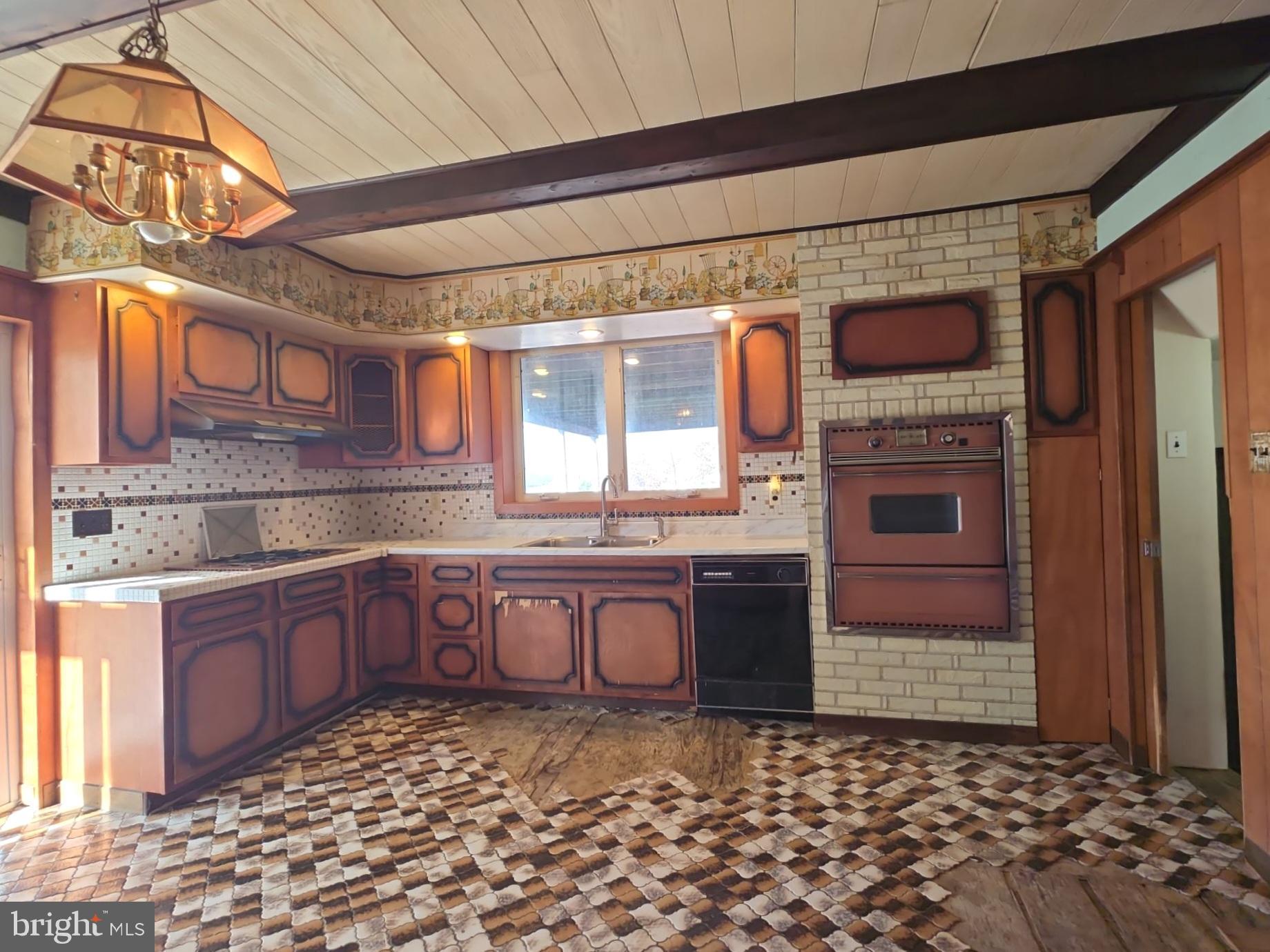 167 Singley Avenue Runnemede, NJ 08078 - Photo 20 of 56 a kitchen with a stove and cabinets