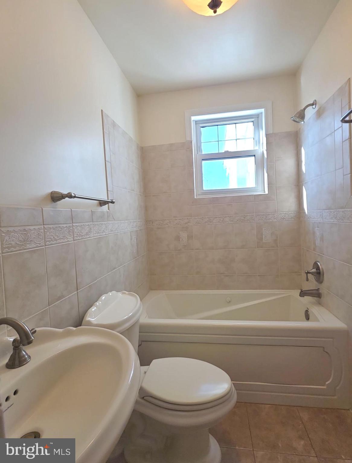 167 Singley Avenue Runnemede, NJ 08078 - Photo 25 of 56 a bathroom with a toilet and a bath tub