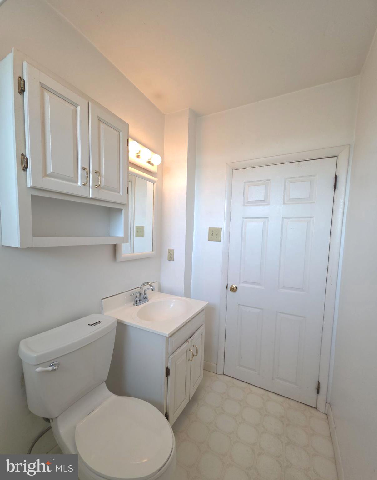 167 Singley Avenue Runnemede, NJ 08078 - Photo 45 of 56 a bathroom with a toilet sink and mirror