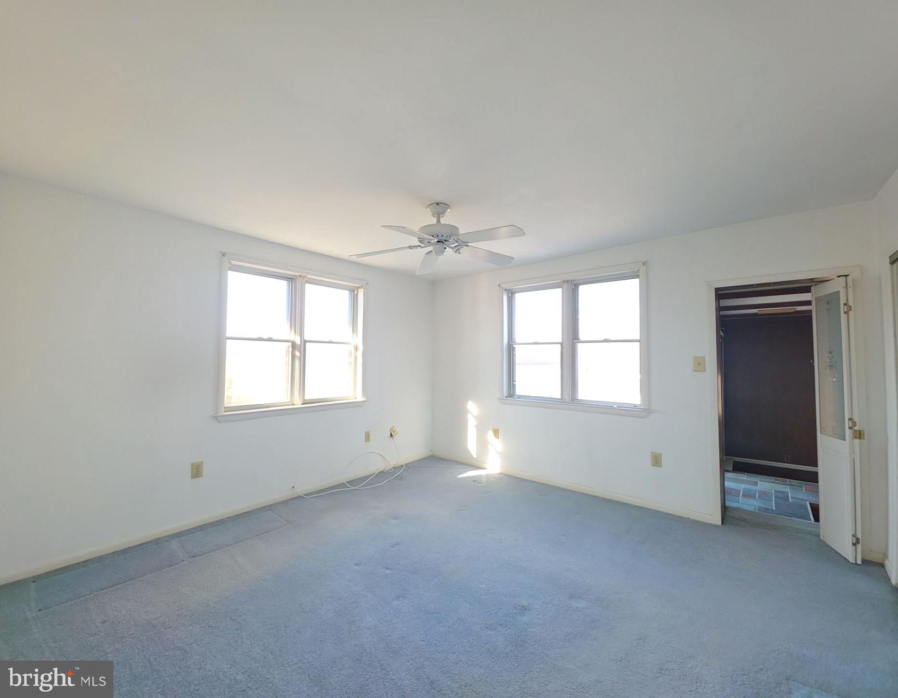 167 Singley Avenue Runnemede, NJ 08078 - Photo 47 of 56 an empty room with a empty space and windows