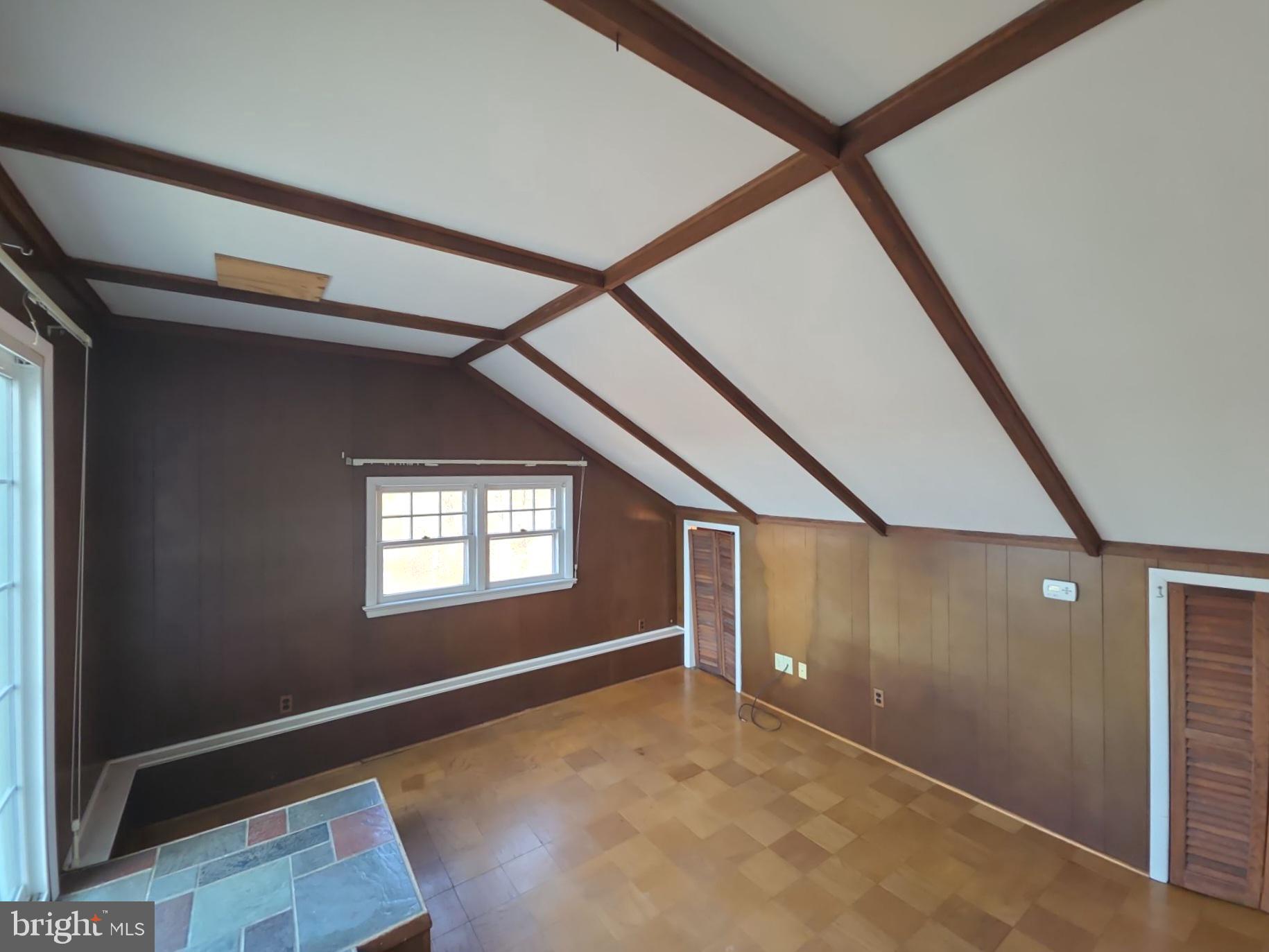 167 Singley Avenue Runnemede, NJ 08078 - Photo 50 of 56 a view of an empty room with wooden floor and windows